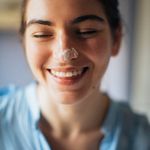 Headshot of Zorianna, a smiling woman with a calm demeanor.